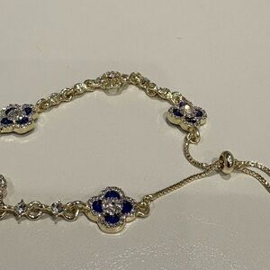 Elegant Gold and Blue Clover Bracelet